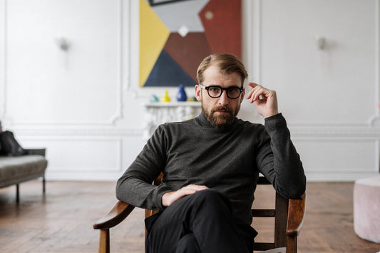 A man sitting ready to talk about the Psychology of Goal Setting to unleash your potential